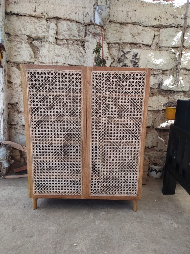 A shoe rack that fits in a number of pairs of shoes de-clutters the floor space.